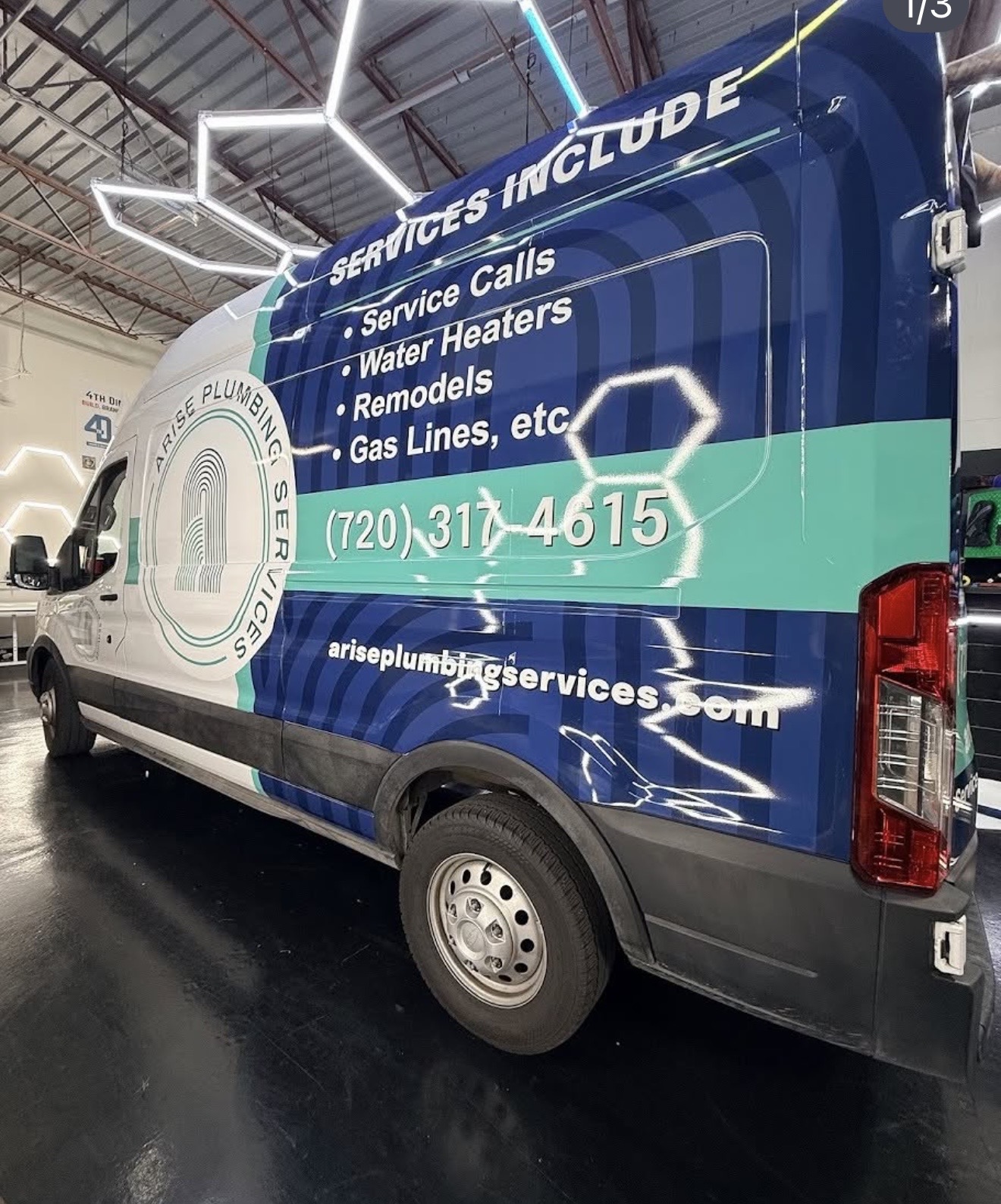 Arise Plumbing Services Ford Transit wrapped in branded service graphics