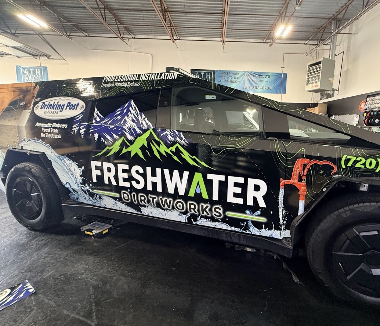 Tesla Cybertruck wrapped for Freshwater Dirtworks inside the 4th Dimension shop
